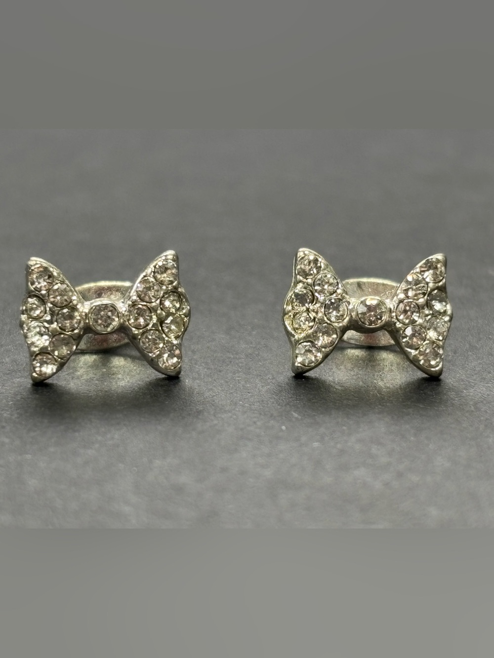 Rhinestone Bow Stud Earrings in Silver Tone